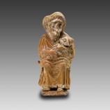 Greek Terracotta Statuette of a Grotesque Nurse and her BabyGreek Terracotta Statuette of a Grotesque Nurse and her Baby